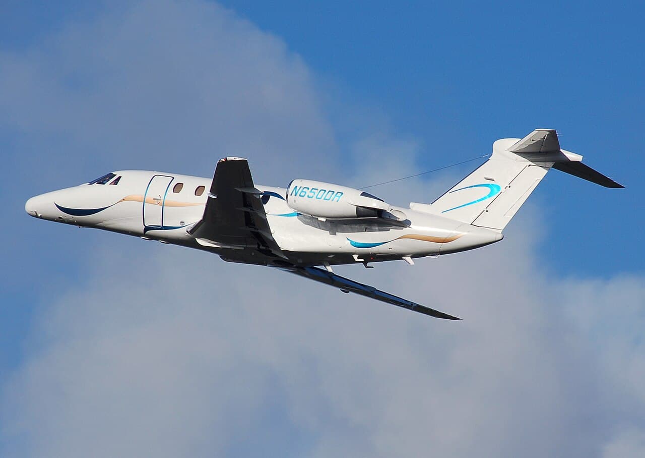 Cessna Citation III N650DR taking off against a blue sky