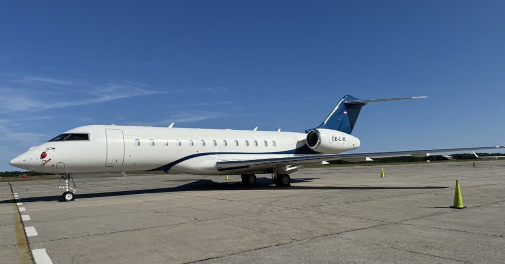 Business jet parked on an airport ramp