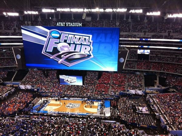 Final Four display above a basketball court and crowd